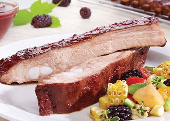 Barbecued St. Louis Style ribs with chipotle blackberry sauce