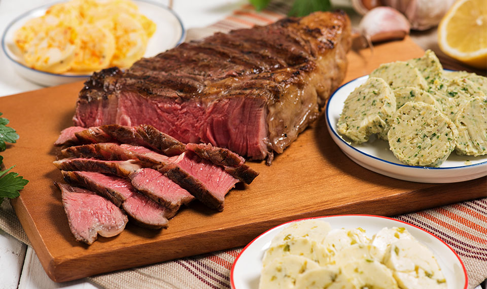Grilled Ribeye Steak with a Trio of Compound Butters